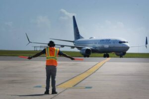 Barbados official welcoming United Airlines at International airport 