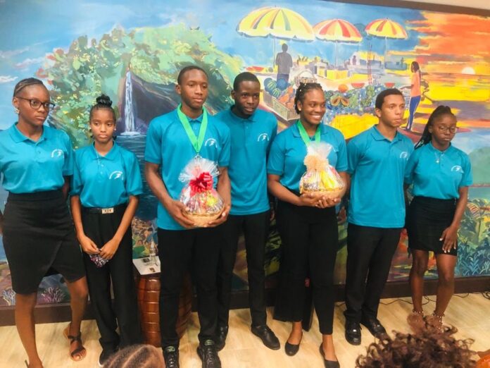 Dominican Sports Ministry welcomes athletes from CARIFTA Games with appreciation token