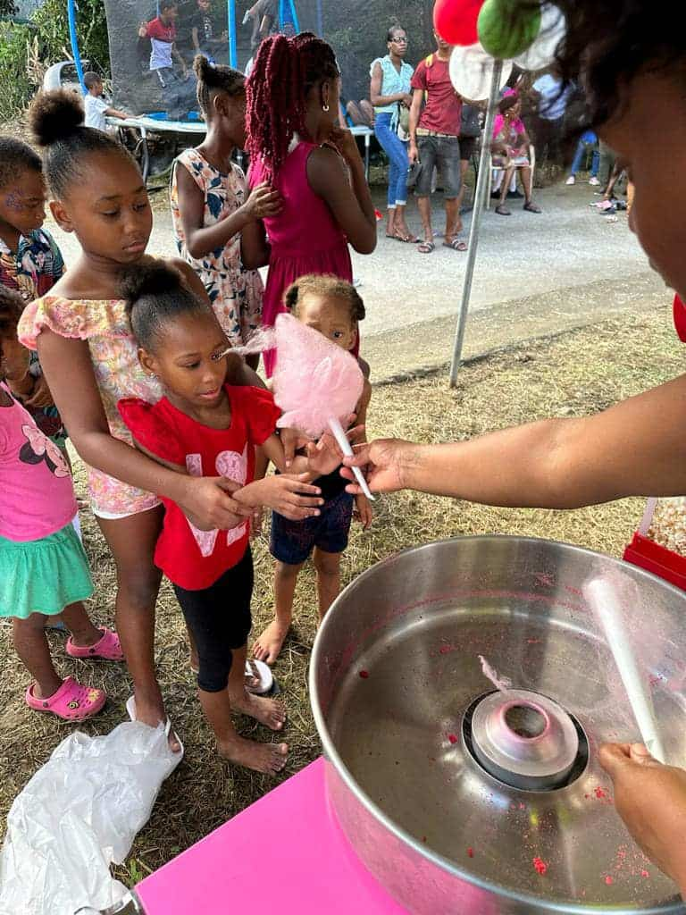 Children enjoy feast during the celebration. (Credits: Ernest Hilaire, Facebook)