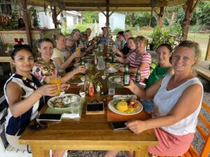 Travelers dining and exploring local cuisines, (credits to Discover Dominica Facebook Page)