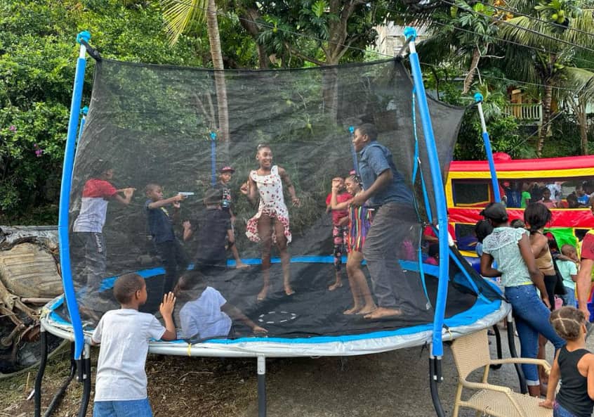 Children enjoys during the Christmas party celebrations. (Credits: Ernest Hilaire, Facebook)