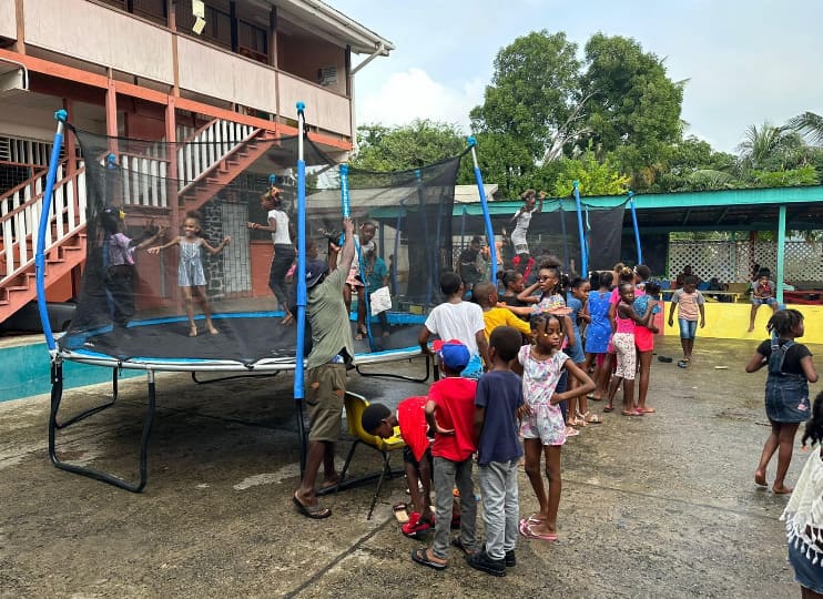 Children enjoying during the Christmas festivities. (Credits: Ernest Hilaire, Facebook)