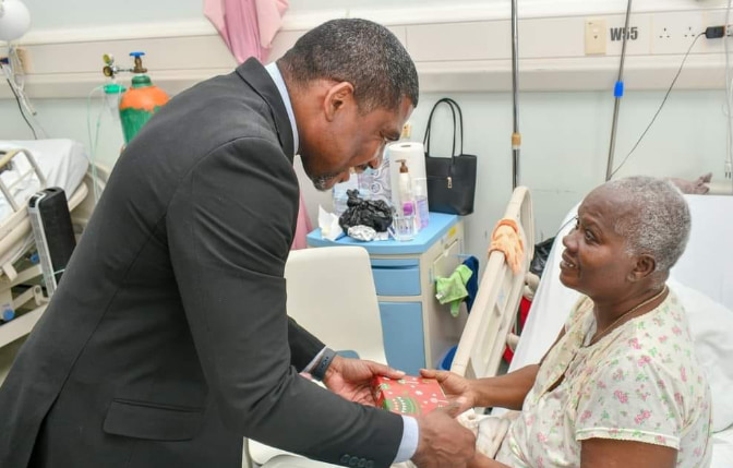 PM Drew distributed gifts during his visit to the hospital. (Credits: Terrance Drew, Facebook)