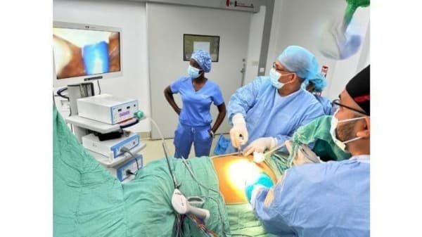 Doctors at GPHC look at a monitor as they perform Guyana's first laparoscopic donor nephrectomy. (Credits: Caribbean National Weekly, Facebook)