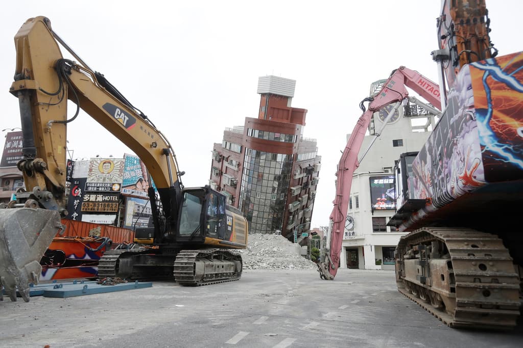 A building is seen partially collapsed due to natural disaster. (AP Photo/Chiang Ying-ying)