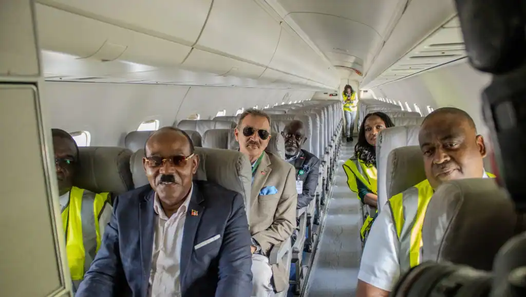 Picture depicts PM Browne's visit onboard during LIAT 2020 aircraft's inspection. (Credits: T&T Guardian, Facebook)