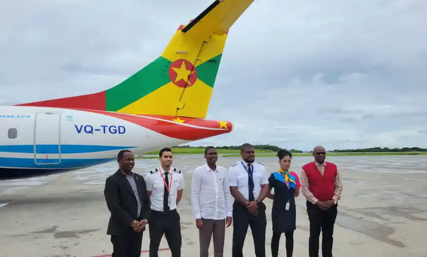 PM Dickon Mitchell and other govt members with Grenadian All-crew