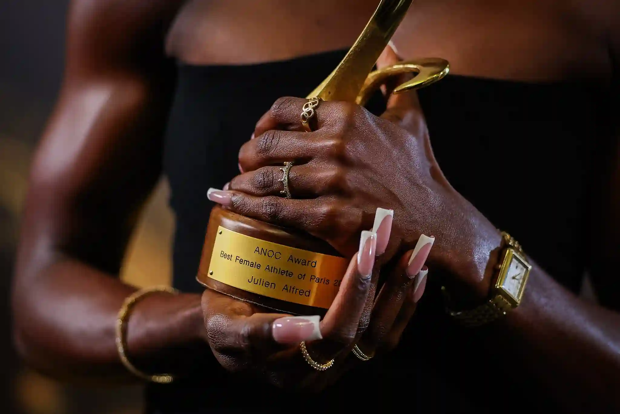 Alfred holding her trophy. Picture Credits: Fb account of Government of Saint Lucia